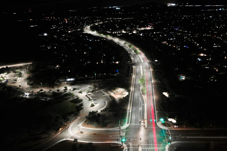 a very long and colorful picture at night with lights