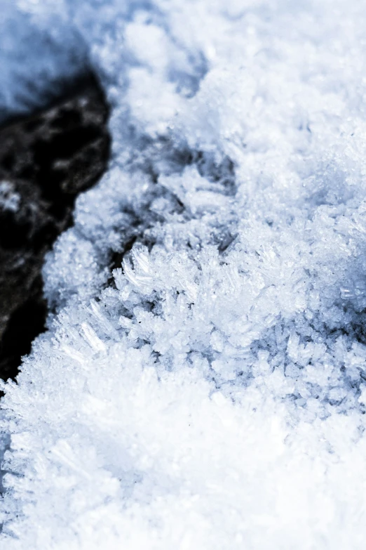 a red object sitting on top of some snow