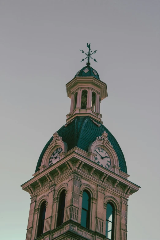 this is the clock on the steeple of a building