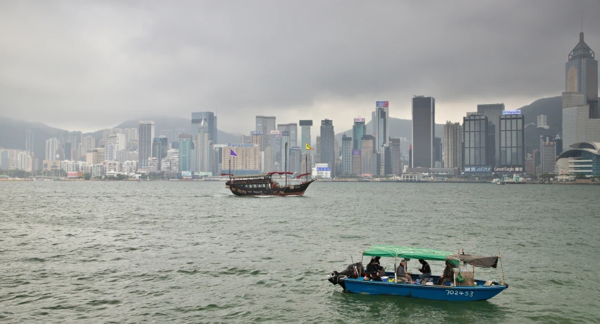 several people on small boats traveling through the water