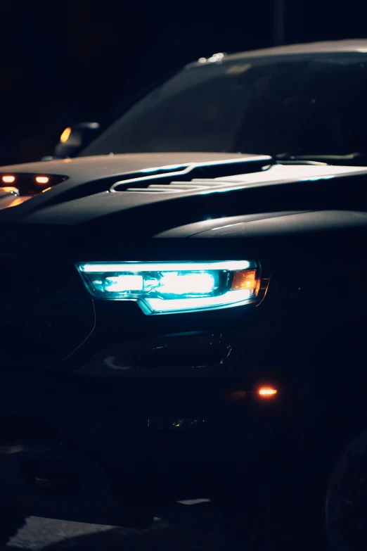 lights on the front of a police car in the dark