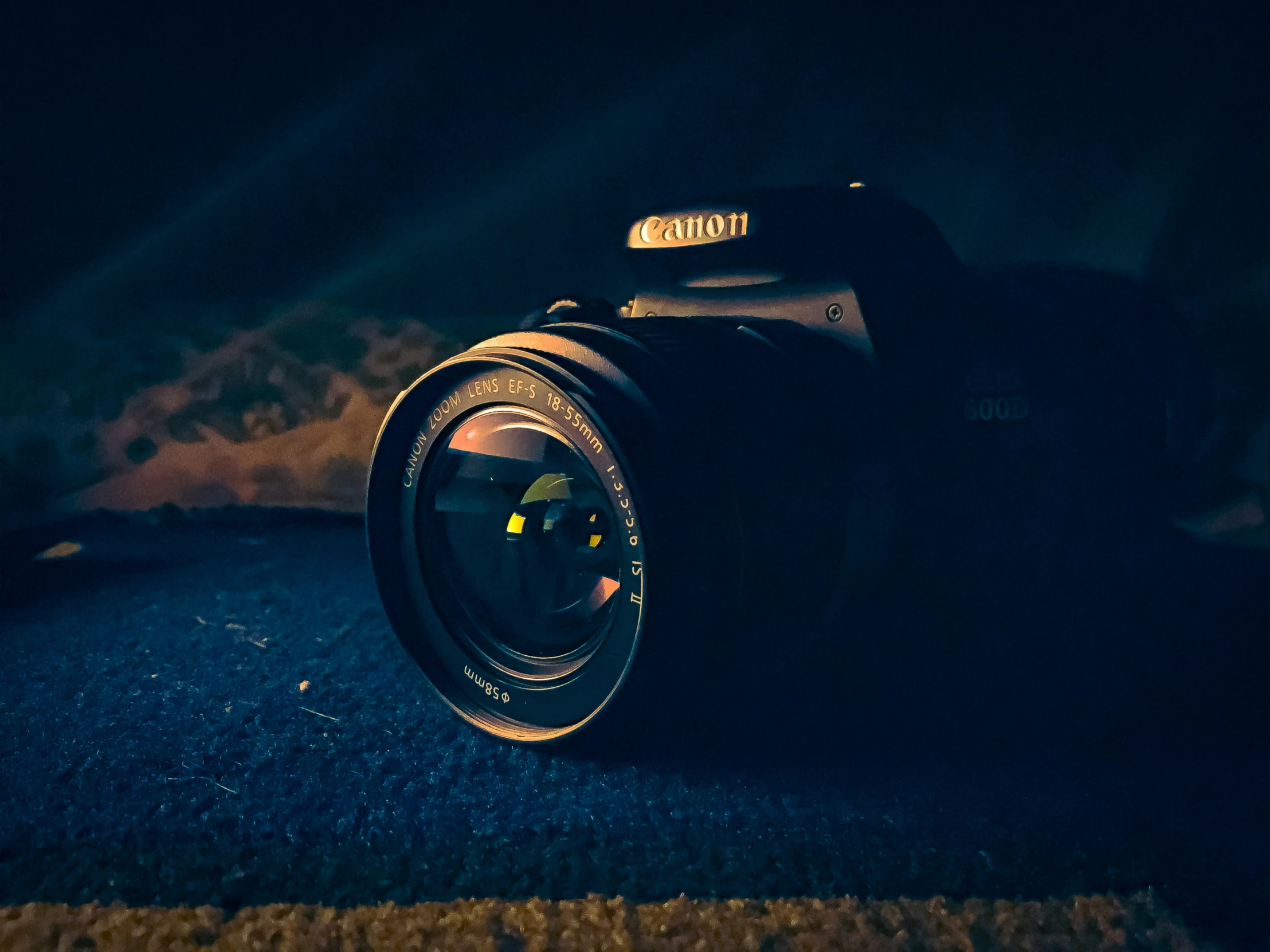 a camera sits on the floor next to the floor