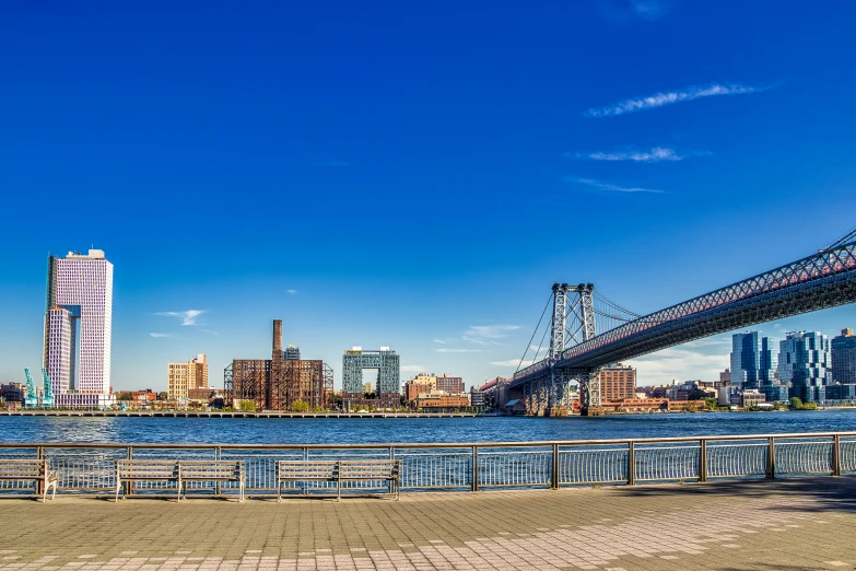 the tall bridge has many large metal structures