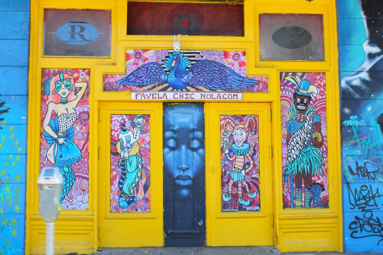 the front door to a building with graffiti painted on it