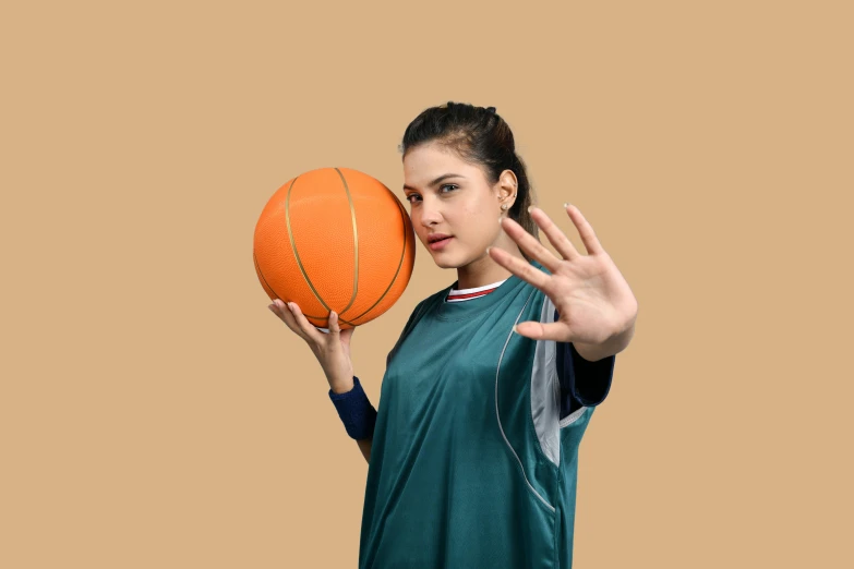 a person is posing with a basketball