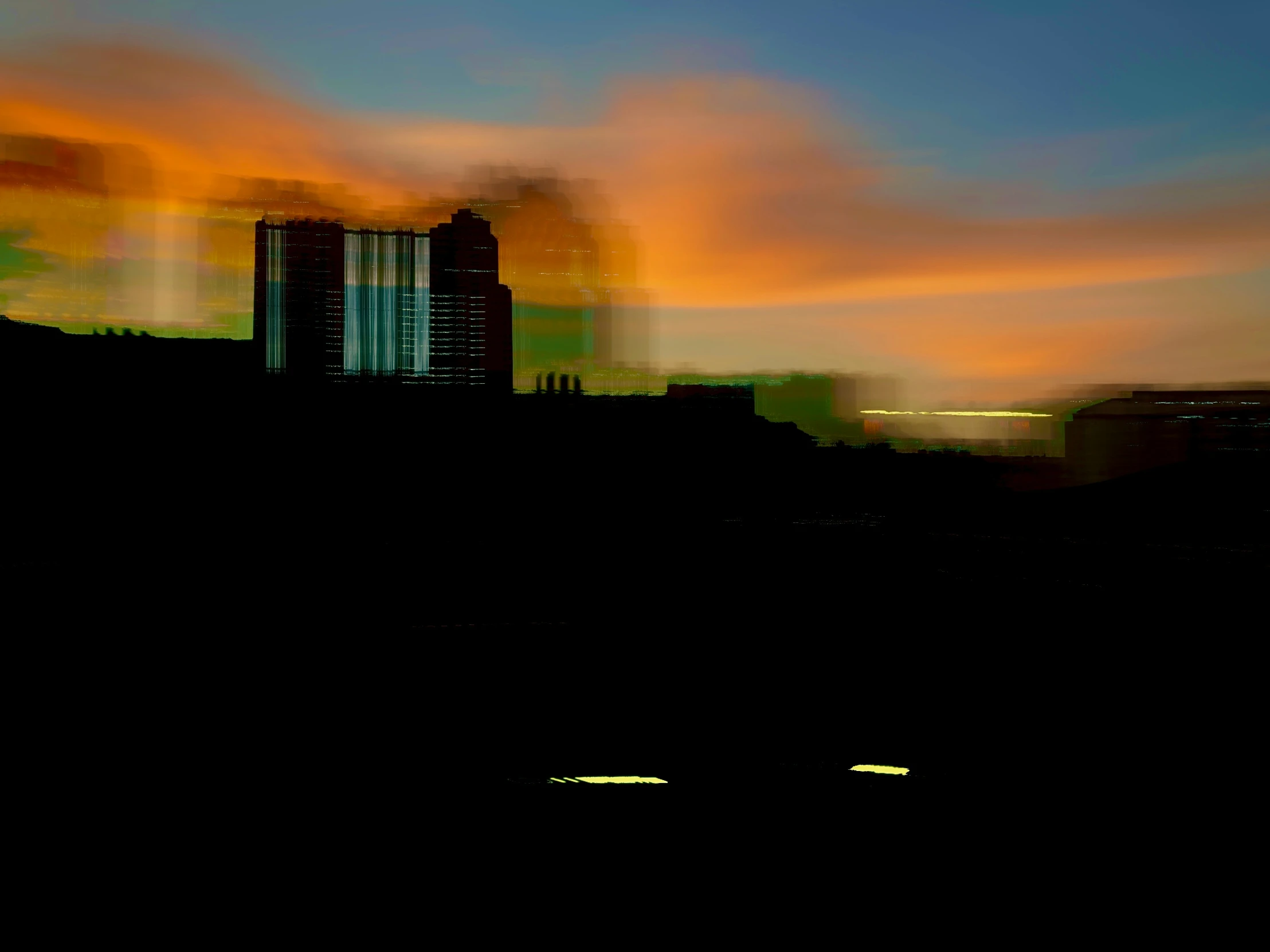 a building with lots of windows on it during a sunset