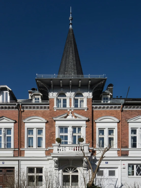 an old building with a clock tower on it's roof