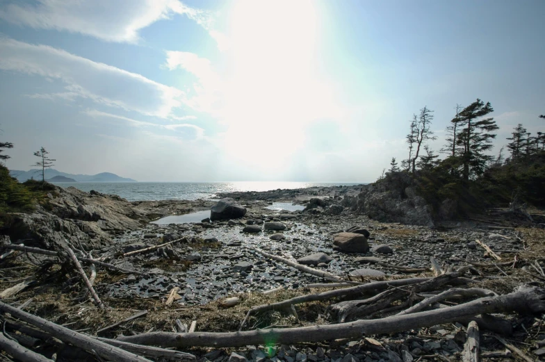 an expanse of water surrounded by bare rocks