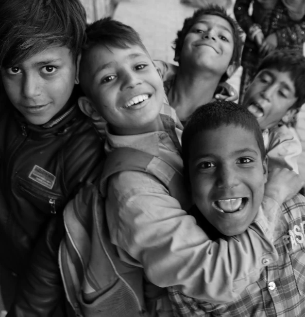 a group of young s posing for a po