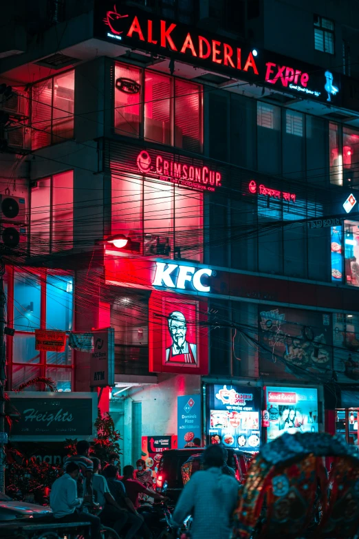 street scene at night in asia with illuminated signs