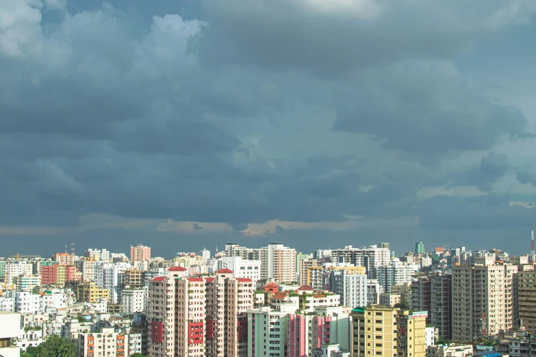 large and multi colored buildings against a gray sky