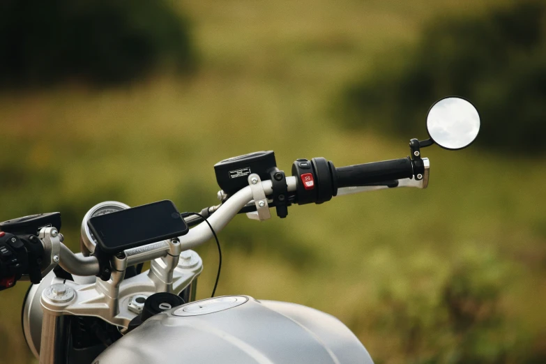 closeup of handle bar and light on motorcycle