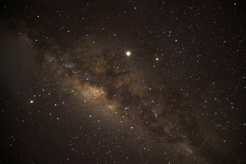 the very distant image shows stars and bright lights