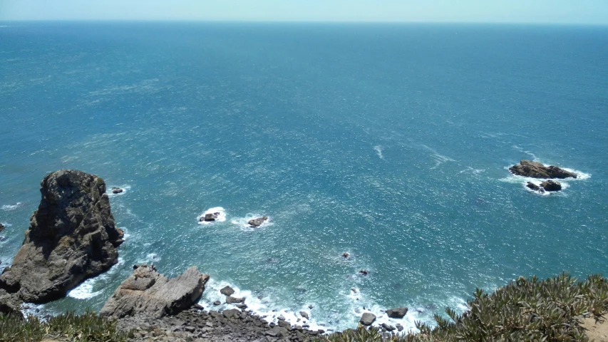 two people are skiing in the blue water