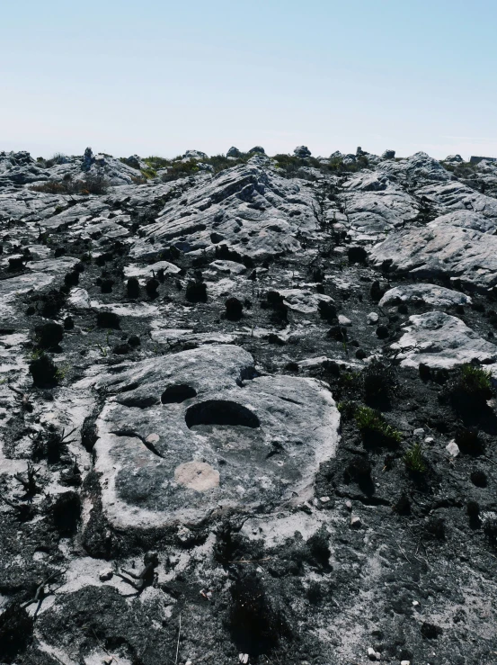 the top of a rocky hill is almost empty