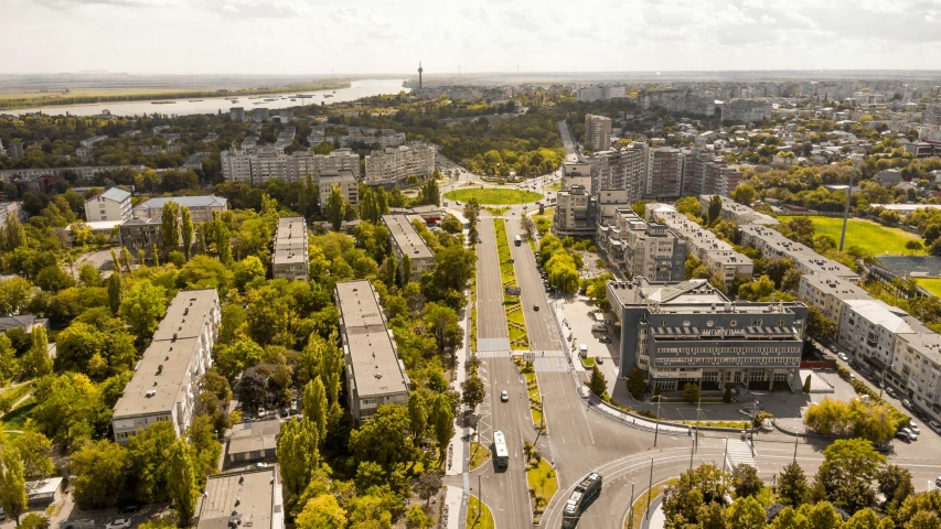 an aerial view of a city near a river