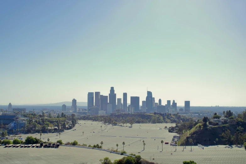 a large sandy area in front of the city