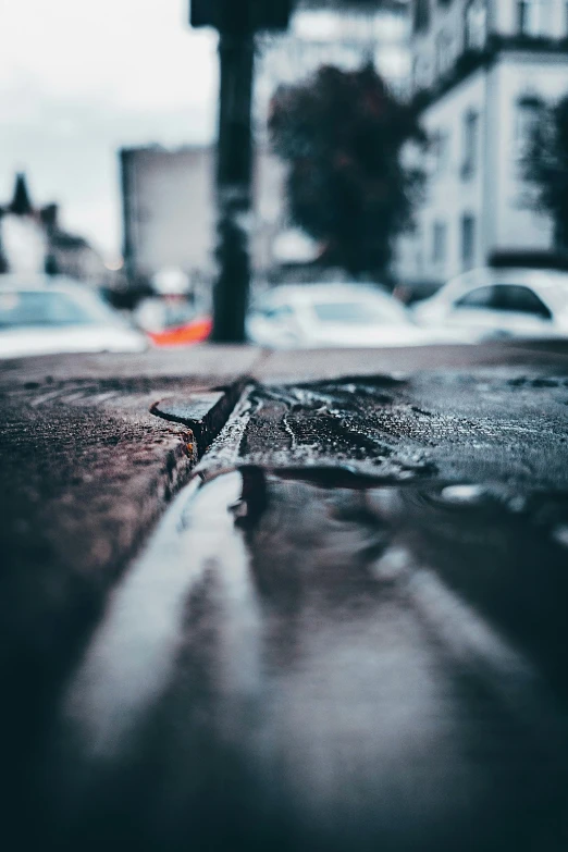 a close up of a street with a red traffic light