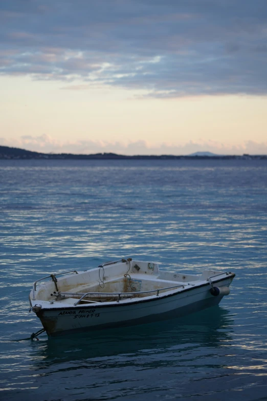 a boat floating in a large body of water