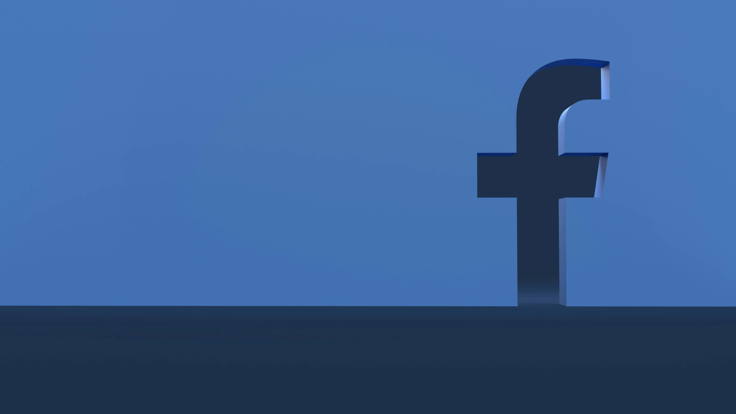 a pograph of the logo for facebook, taken from the ground