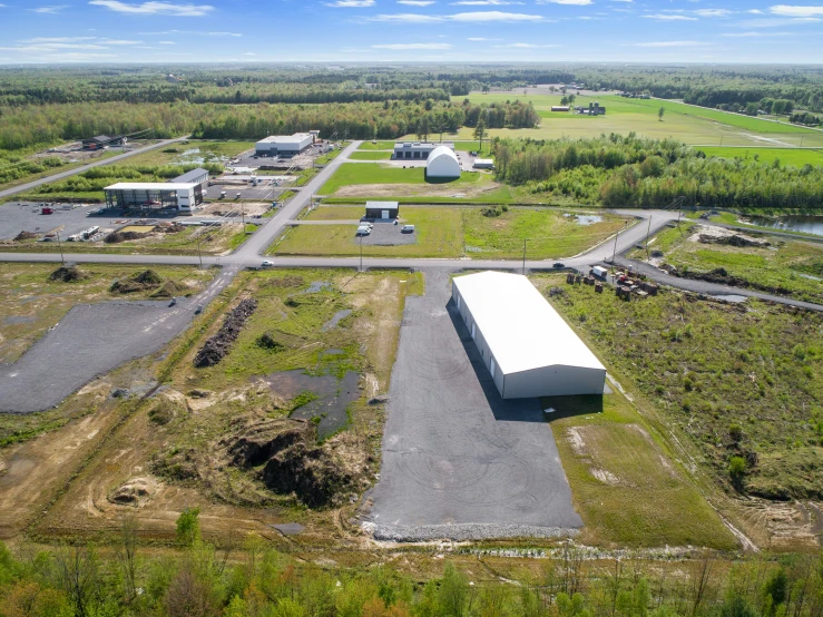 an aerial view of the factory area and surrounding a road