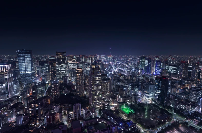 an aerial view of an urban area at night