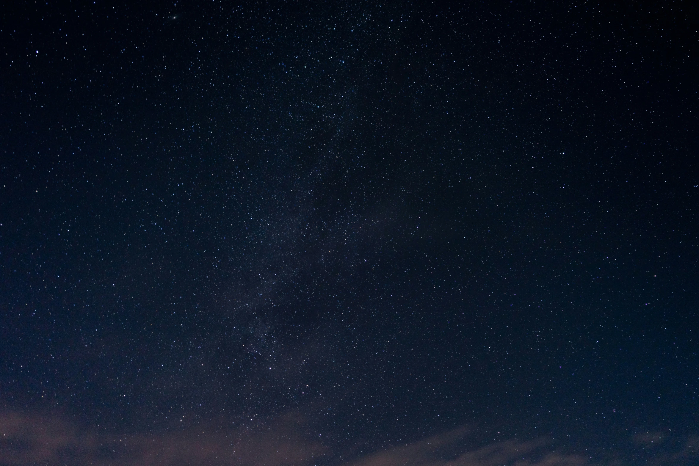 the night sky with a cluster of stars