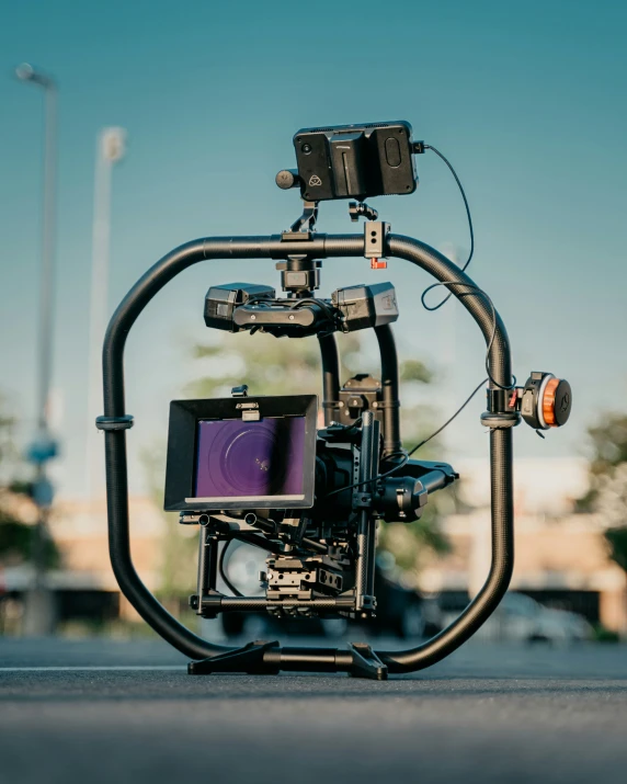 a camera sitting on top of an object with a mirror on it