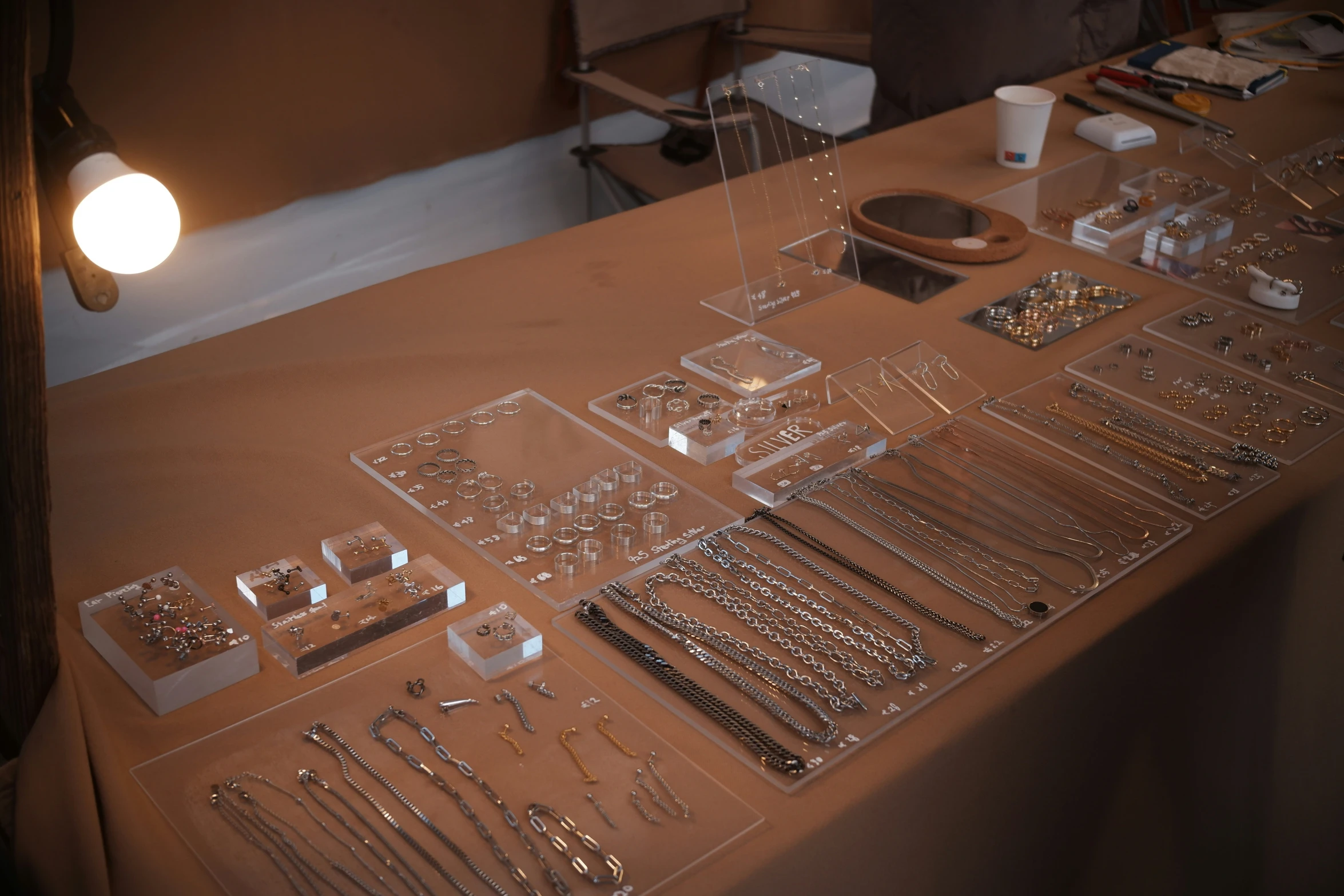 a table has many shiny silver objects on it