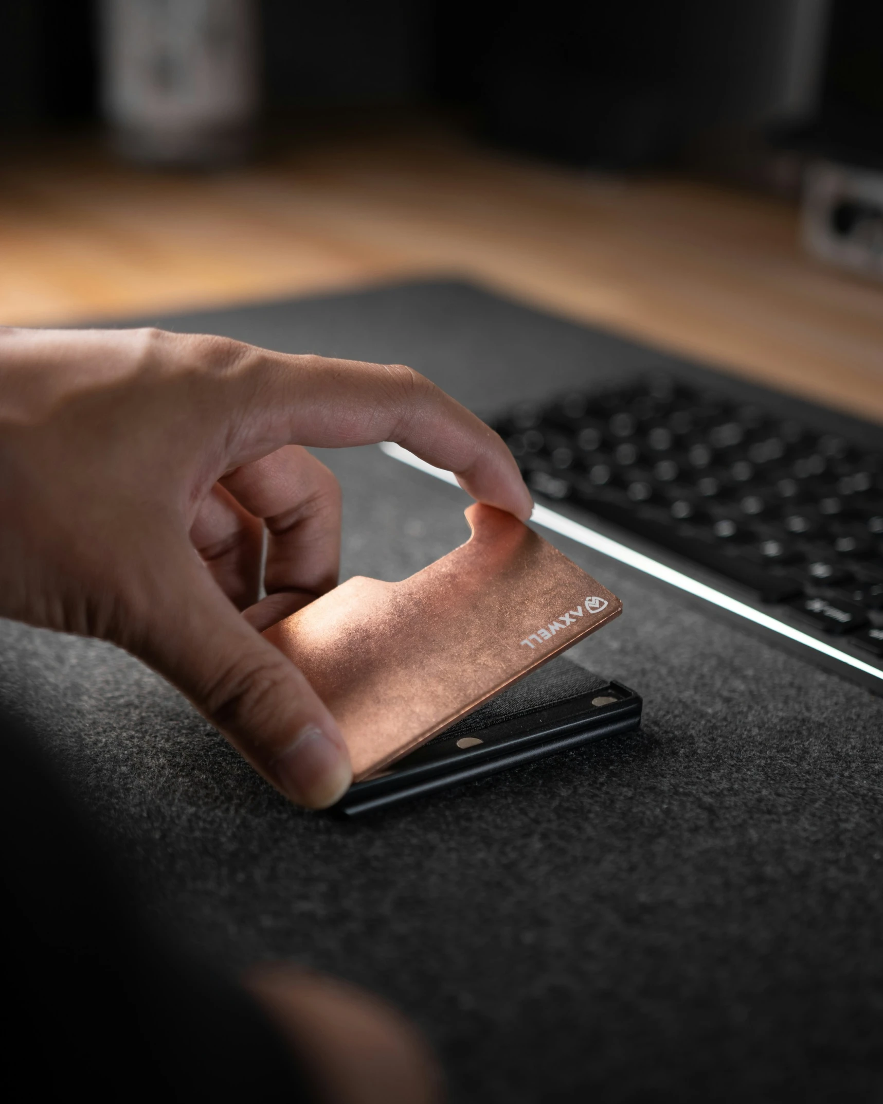 a person is using their finger to h an item on a laptop