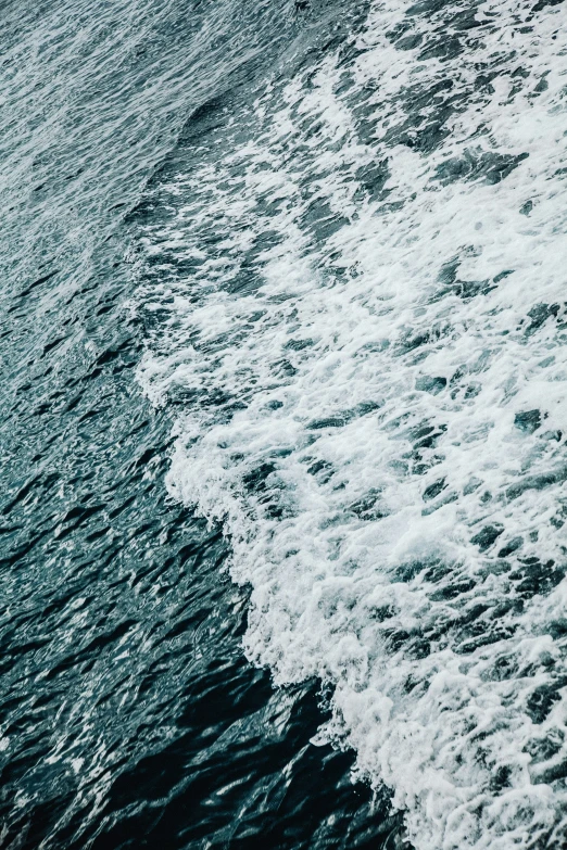 an image of a person riding their surfboard on a wave