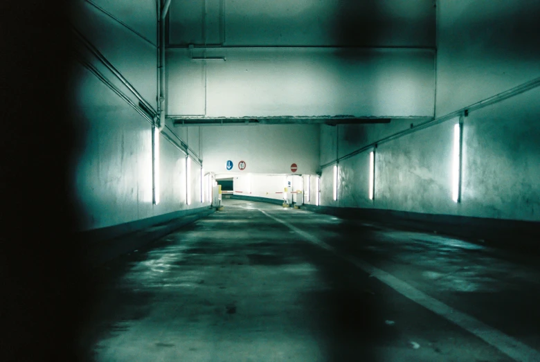 the inside of a building is lit by lights