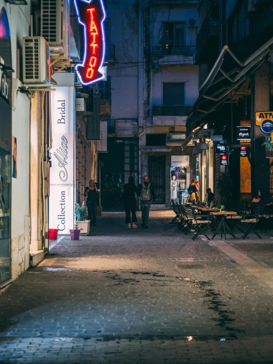 the city street with people walking by is empty