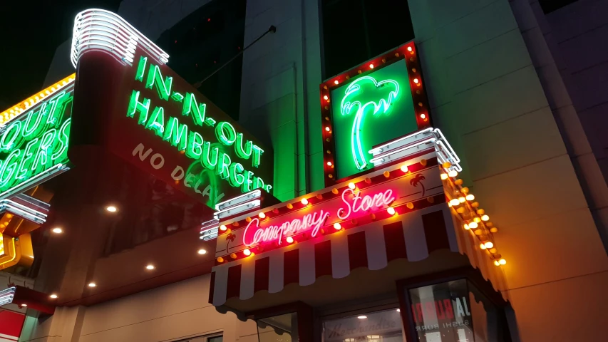 a neon sign and a shop for a birthday celetion