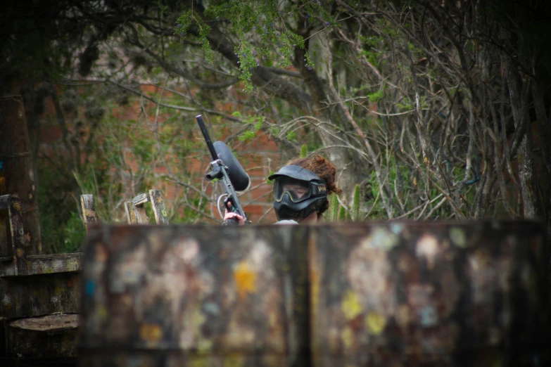 an image of two soldiers looking over a fence