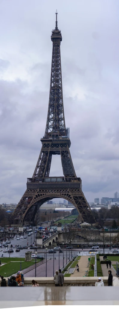 a very tall metal tower sitting in the sky