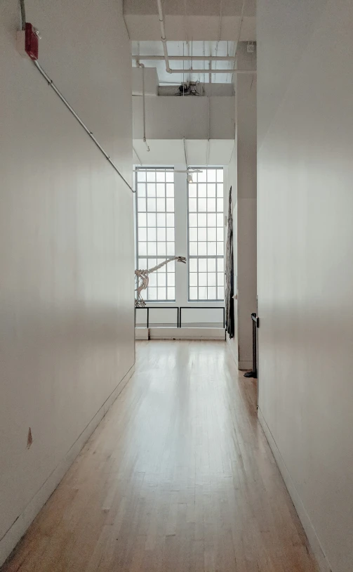 a empty room with lots of white walls