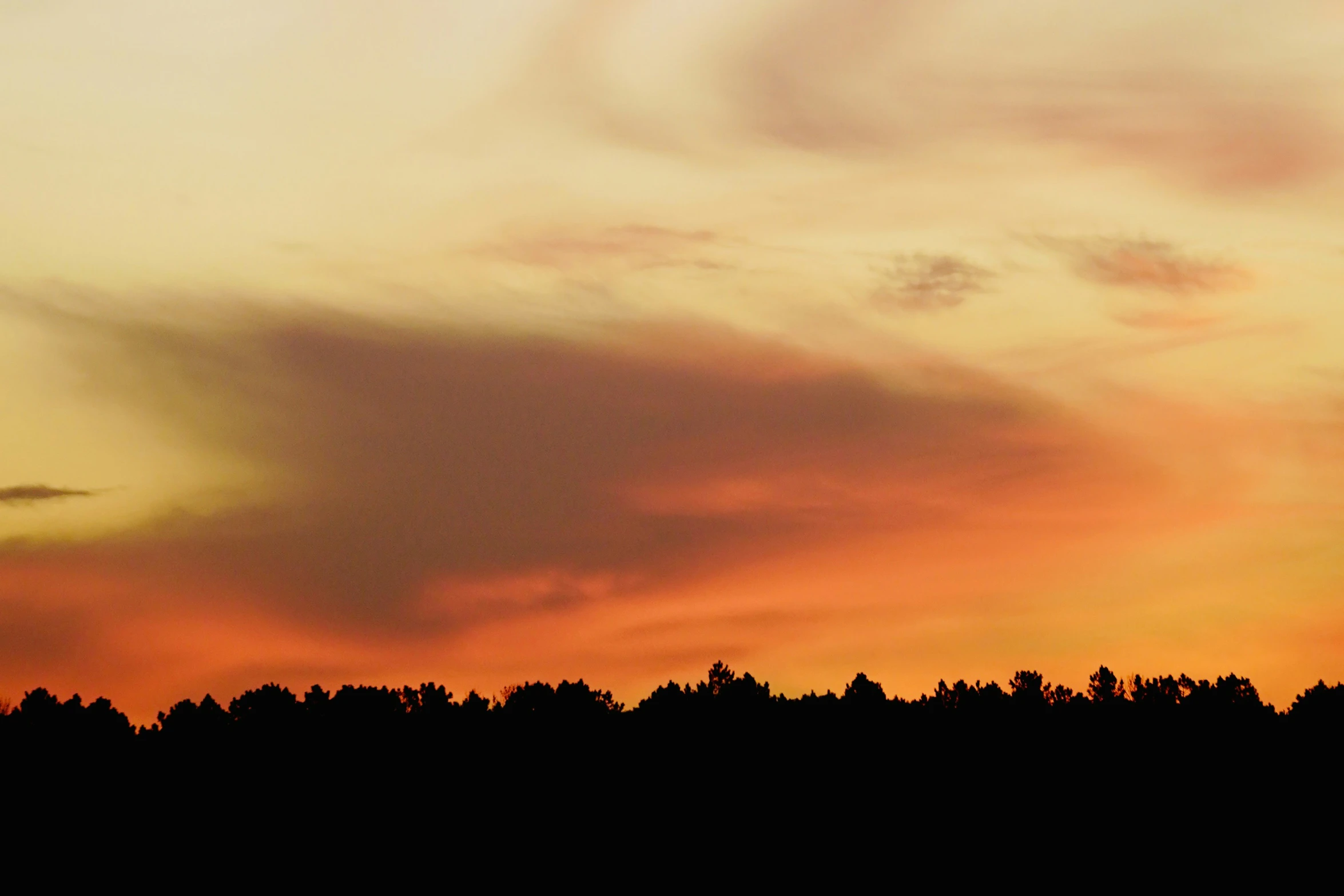 the sky at sunset is full of clouds