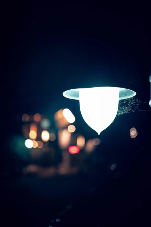 a blurred view of lights on a street at night