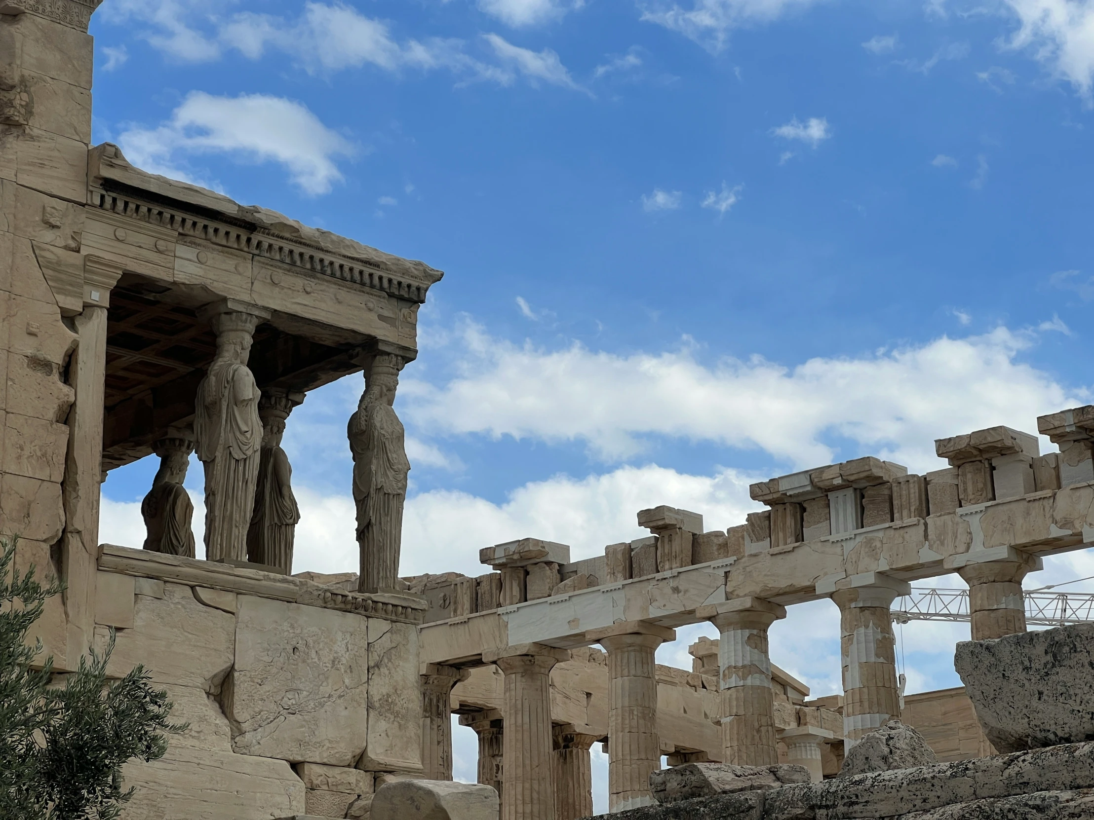 the ruins are all standing together and one is very tall