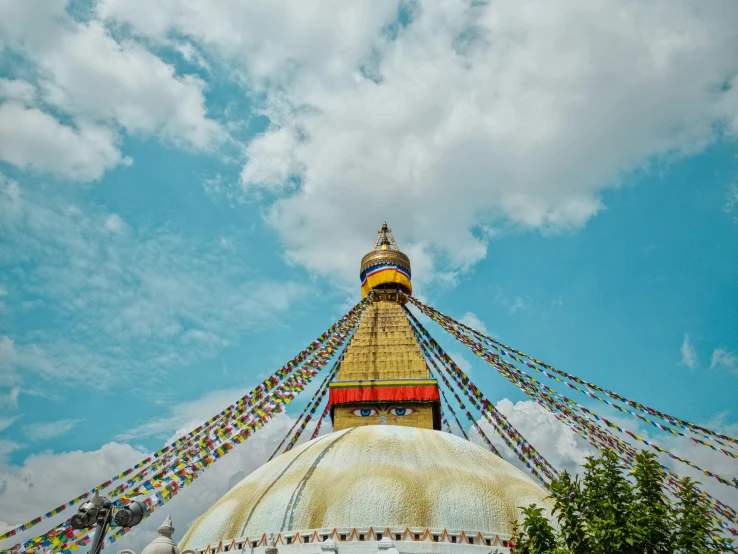 a view up at the top of a large statue in india