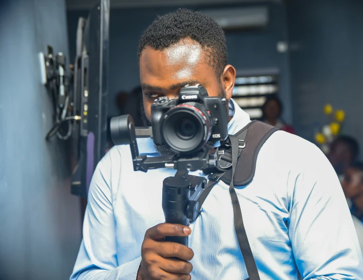 a man with a camera in his hand