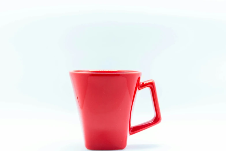 red coffee cup in white background
