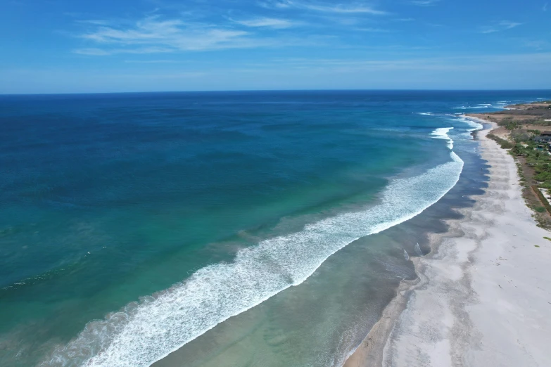 an aerial view of a beach and the ocean