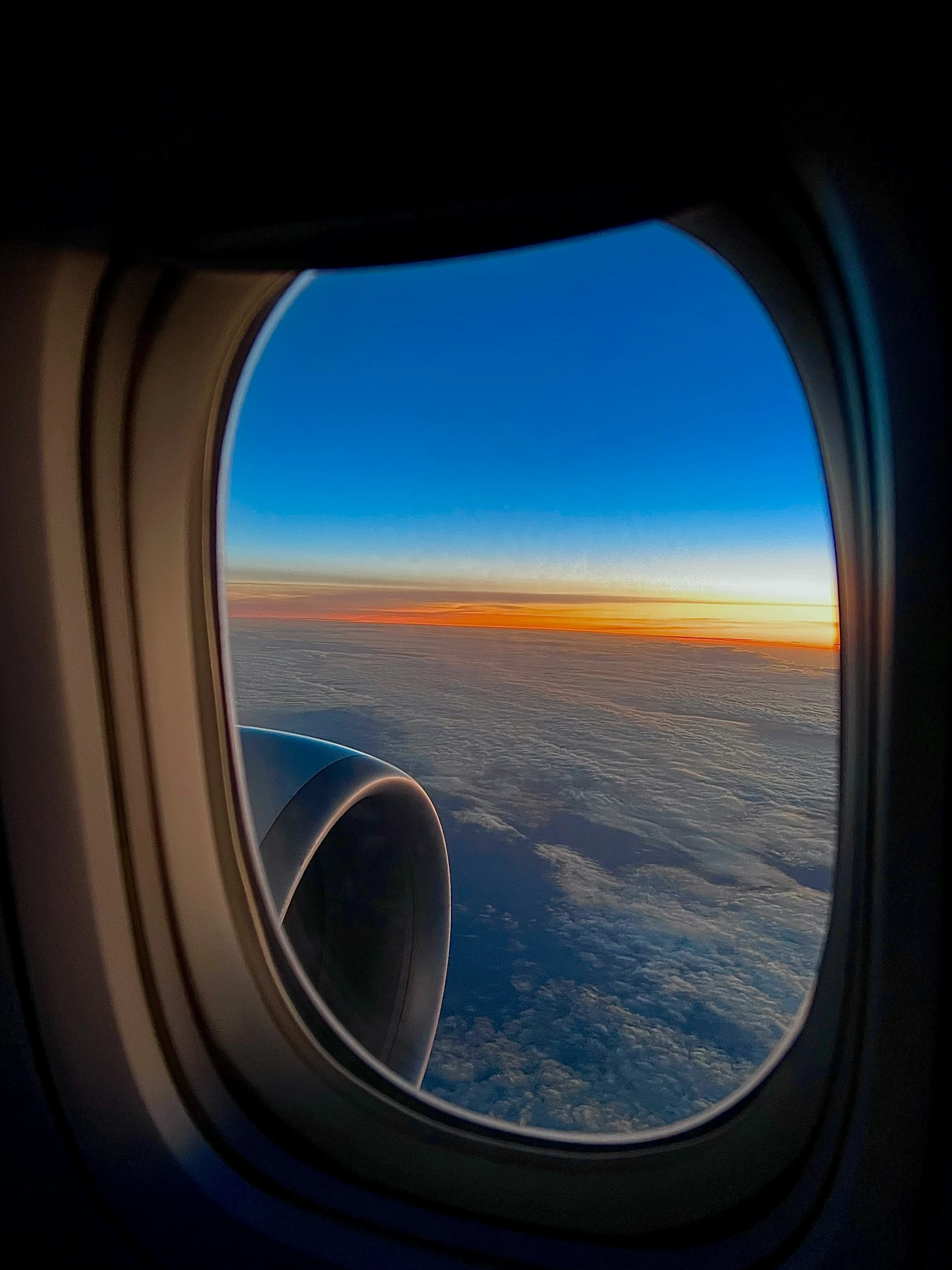 view of clouds taken from the airplane window