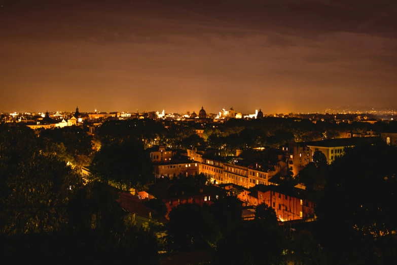 the lights of an apartment complex shine brightly at night