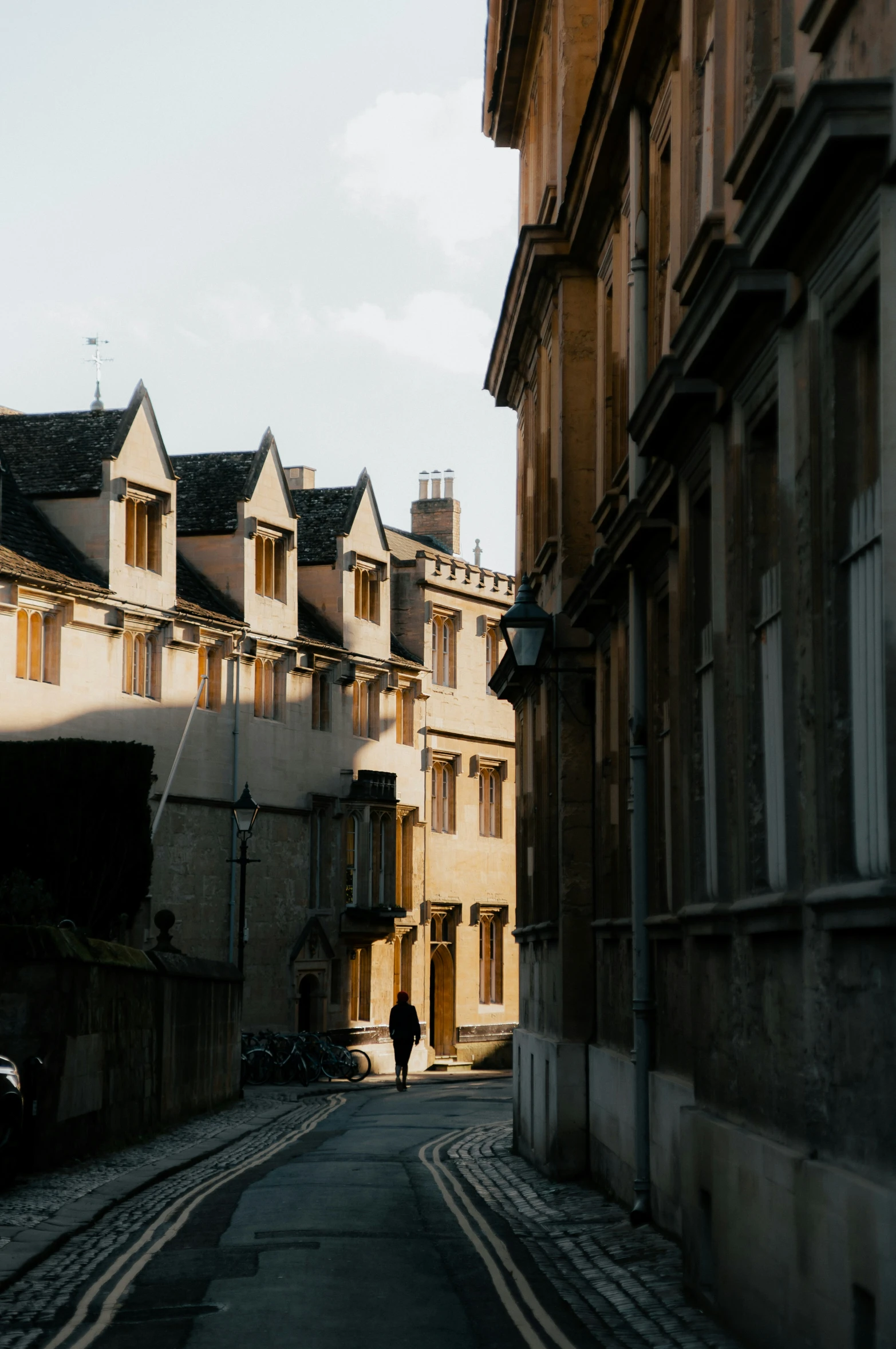 a person walking through an old city street