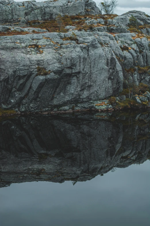 the mountain is reflected in the water