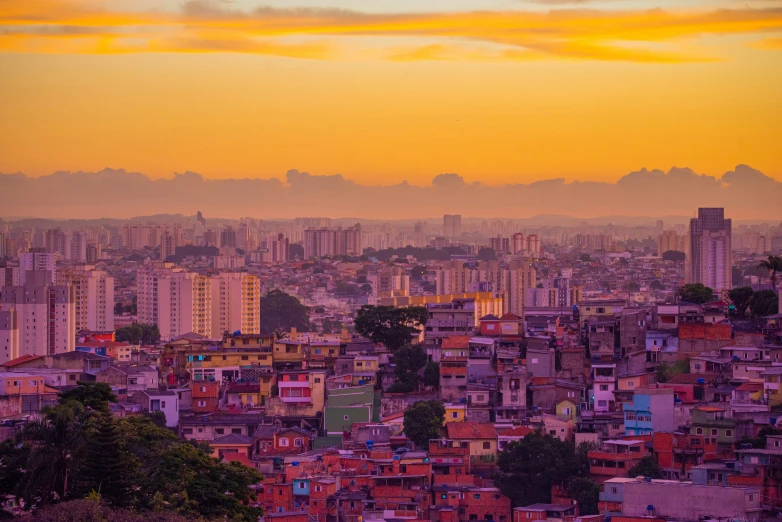 the skyline of mexico is shown during a colorful sunset