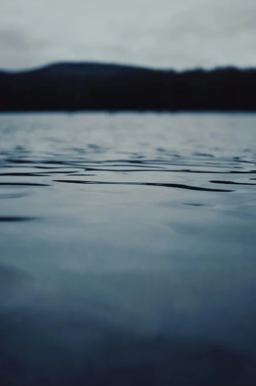 the blue body of water has lots of small waves